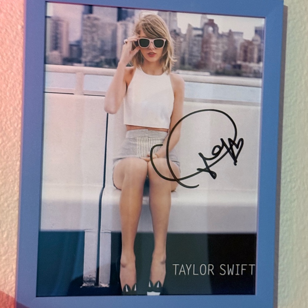 Taylor Swift Autographed Photo in Blue Frame